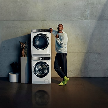 Man next to washing machines